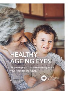 Guide cover that says "Healthy ageing eyes: Simple steps you can take to protect your vision for the future" and shows a picture of an older woman with short grey hair holding a baby. The baby is smiling at the camera and the woman is turned to look at the baby.