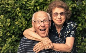Irene and husband George in their garden