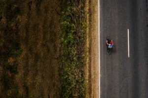 Overhead image of man cycling on the road