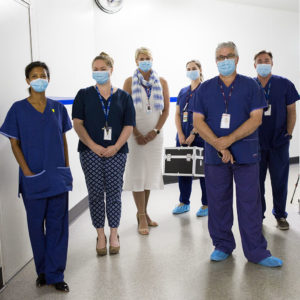 Dr Graeme Pollock OAM and the LEDS team in masks