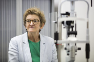 Photo of Professor Robyn Guymer AM with testing equipment in the background.