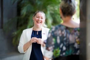 Heather Machin speaks to a patient
