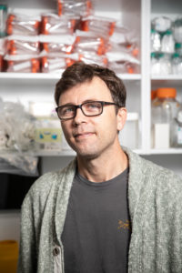 Photo of Dr Luis Alarcon-Martinez face to camera in one of the research labs at CERA.