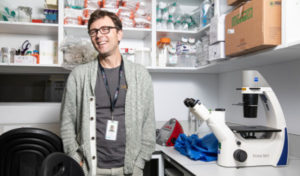 Photo of Dr Luis Alarcon-Martinez face to camera in one of the research labs at CERA.