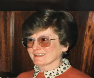 Head and shoulders photograph of Joan Garden, smiling.
