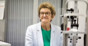 Photo of Professor Robyn Guymer AM with testing equipment in the background.