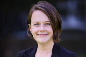 Photo of A/Prof Lauren Ayton, standing outside