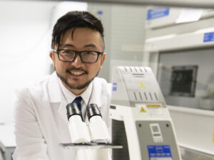 Head and shoulders shot of Associate Professor Ray Wong in the lab.