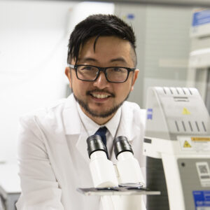 Head and shoulders shot of Associate Professor Ray Wong in the lab.